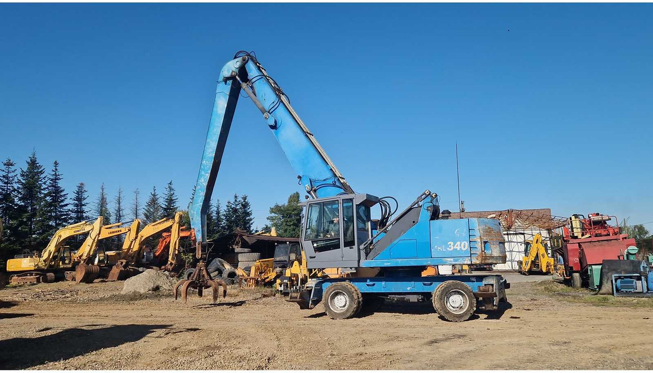 TEREX FUCHS MHL 340 - Bager na kolesih: slika 1 TEREX FUCHS MHL 340 - Bager na kolesih: slika 1