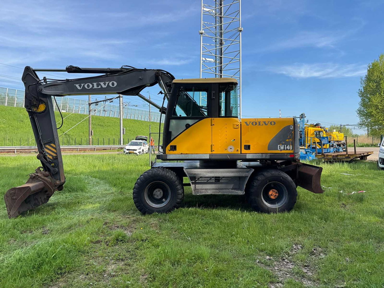 Volvo EW140 - Bager na kolesih: slika 1 Volvo EW140 - Bager na kolesih: slika 1