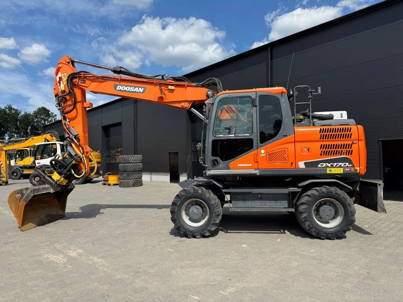 Doosan DX170-5 Engcon Gripper S Afneembaar. - Bager na kolesih: slika 1 Doosan DX170-5 Engcon Gripper S Afneembaar. - Bager na kolesih: slika 1