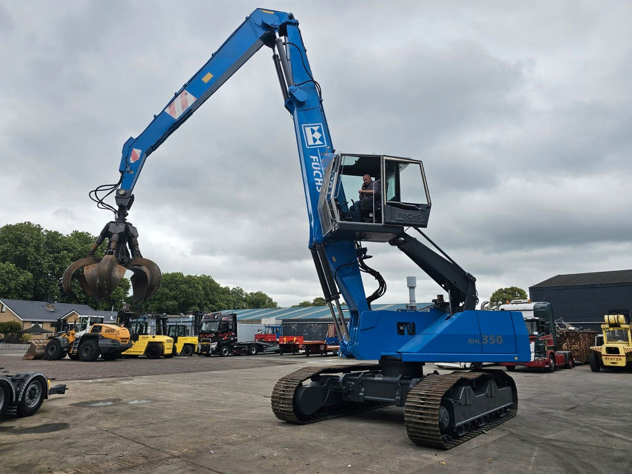 Fuchs RHL 350 Umschlagbagger Mit Verstellbare Raupen - Buldožer: slika 1 Fuchs RHL 350 Umschlagbagger Mit Verstellbare Raupen - Buldožer: slika 1
