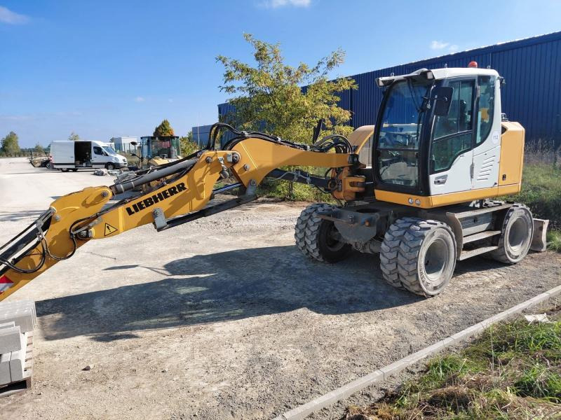 Liebherr A910 A910 - Bager na kolesih: slika 1 Liebherr A910 A910 - Bager na kolesih: slika 1