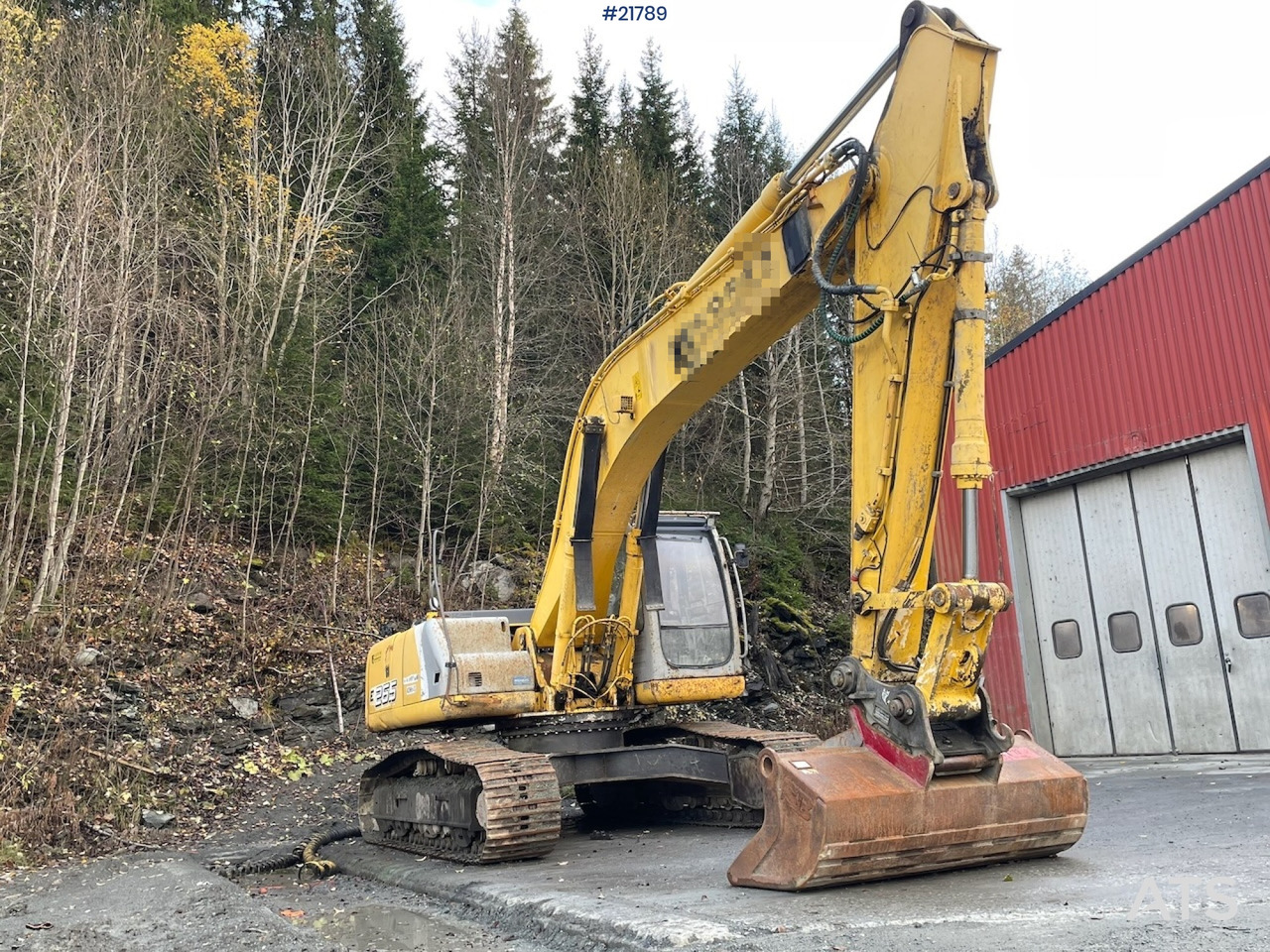New Holland E265 med graveskuffe - Bager goseničar: slika 1 New Holland E265 med graveskuffe - Bager goseničar: slika 1