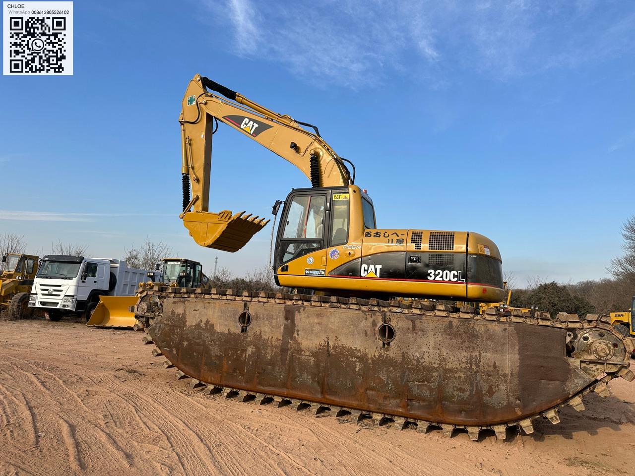 CATERPILLAR 320CL - Amfibijski bager: slika 1 CATERPILLAR 320CL - Amfibijski bager: slika 1