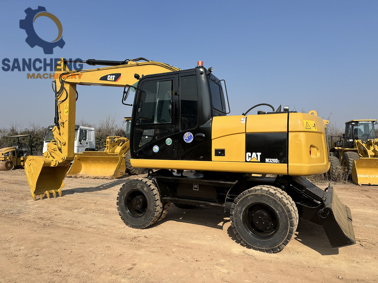CATERPILLAR M320D2 - Bager na kolesih: slika 1 CATERPILLAR M320D2 - Bager na kolesih: slika 1