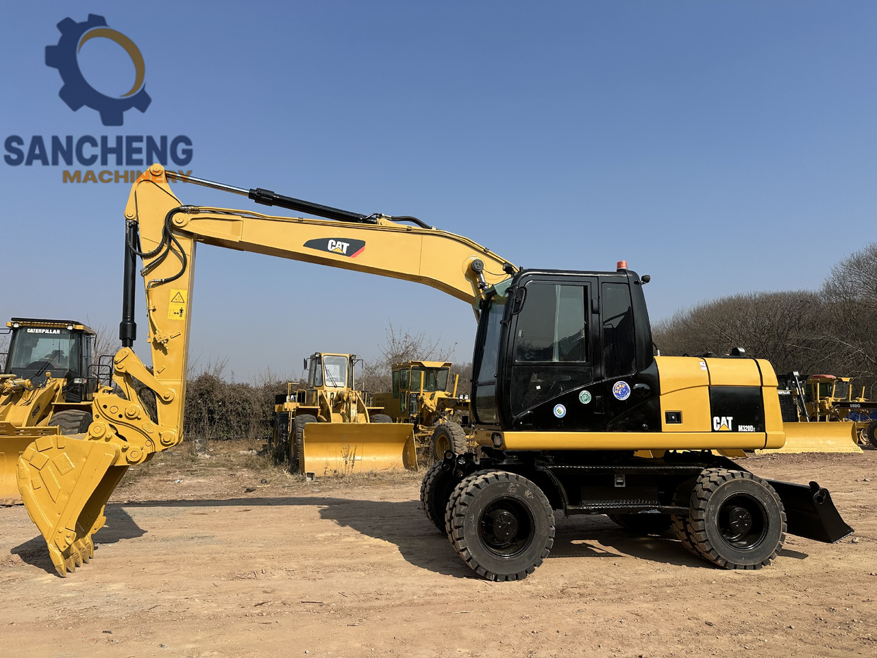CATERPILLAR M320D2 - Bager na kolesih: slika 5 CATERPILLAR M320D2 - Bager na kolesih: slika 5