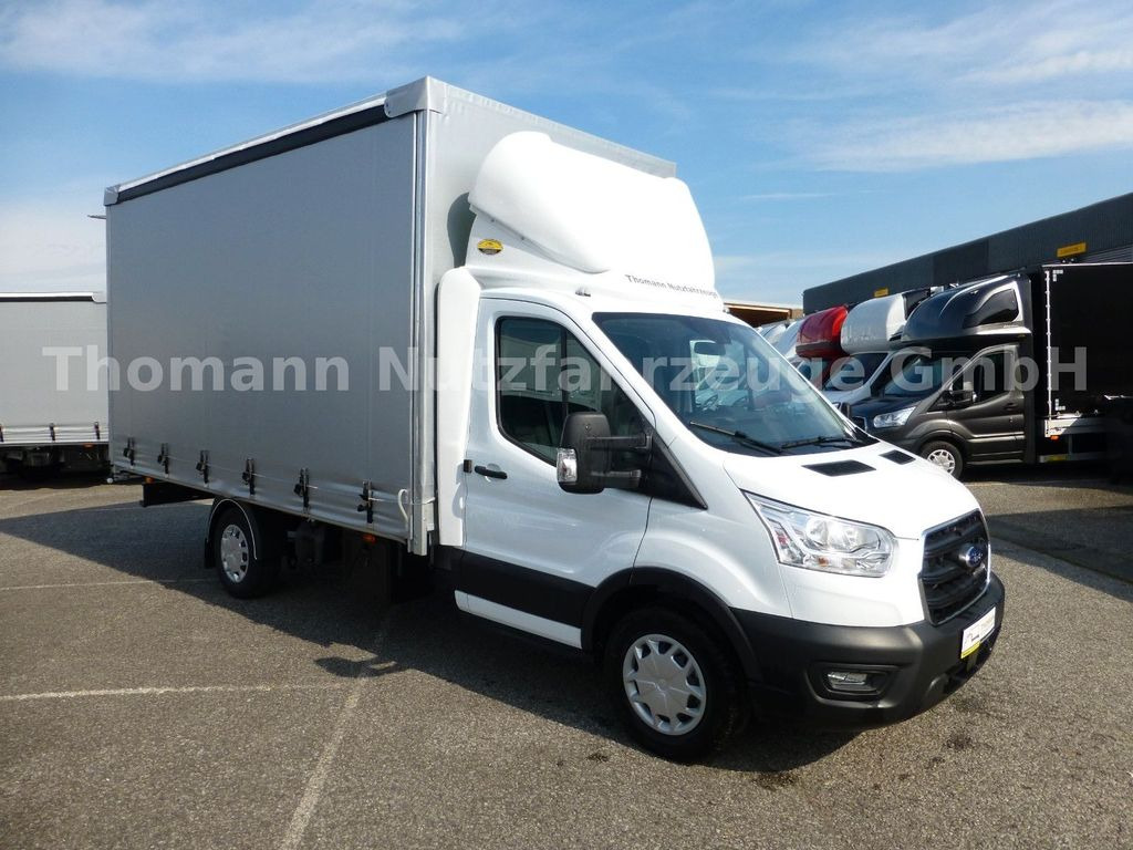 Ford Transit Pritsche Plane 4,25m Klima Temp. DAB - Dostavno vozilo s ponjavo: slika 1 Ford Transit Pritsche Plane 4,25m Klima Temp. DAB - Dostavno vozilo s ponjavo: slika 1