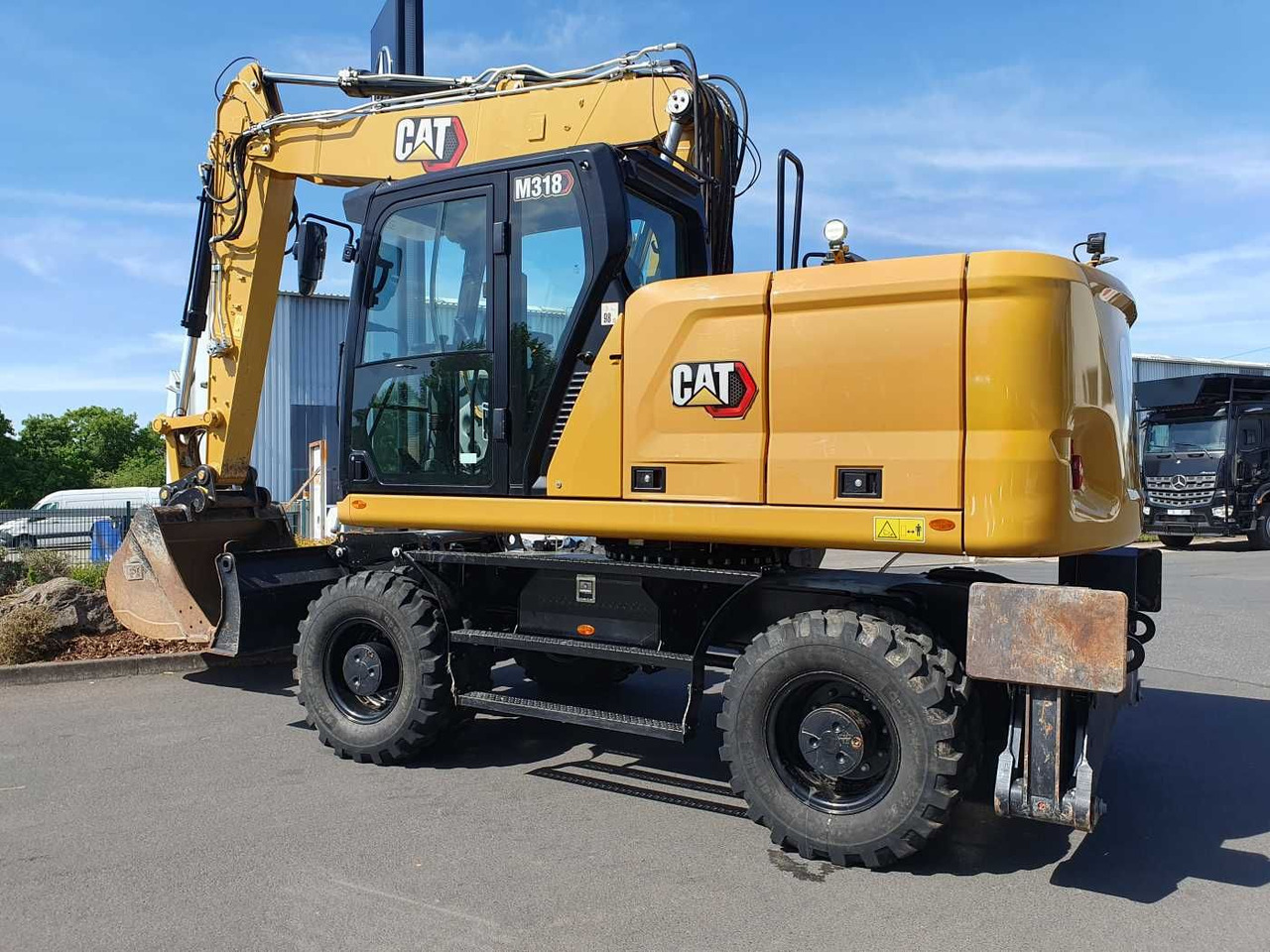 CAT M318 / 2022 / nur 286h! / Tieflöffel / Pratzen - Bager na kolesih: slika 3 CAT M318 / 2022 / nur 286h! / Tieflöffel / Pratzen - Bager na kolesih: slika 3