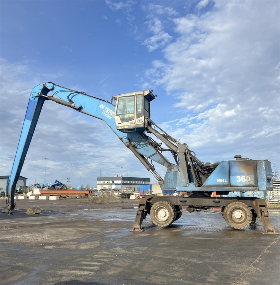 Fuchs MHL 360 - Bager za prekladanje primarnih/ Sekundarnih surovin: slika 1 Fuchs MHL 360 - Bager za prekladanje primarnih/ Sekundarnih surovin: slika 1