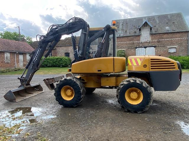 Mecalac 12 MXT - Bager na kolesih: slika 1 Mecalac 12 MXT - Bager na kolesih: slika 1