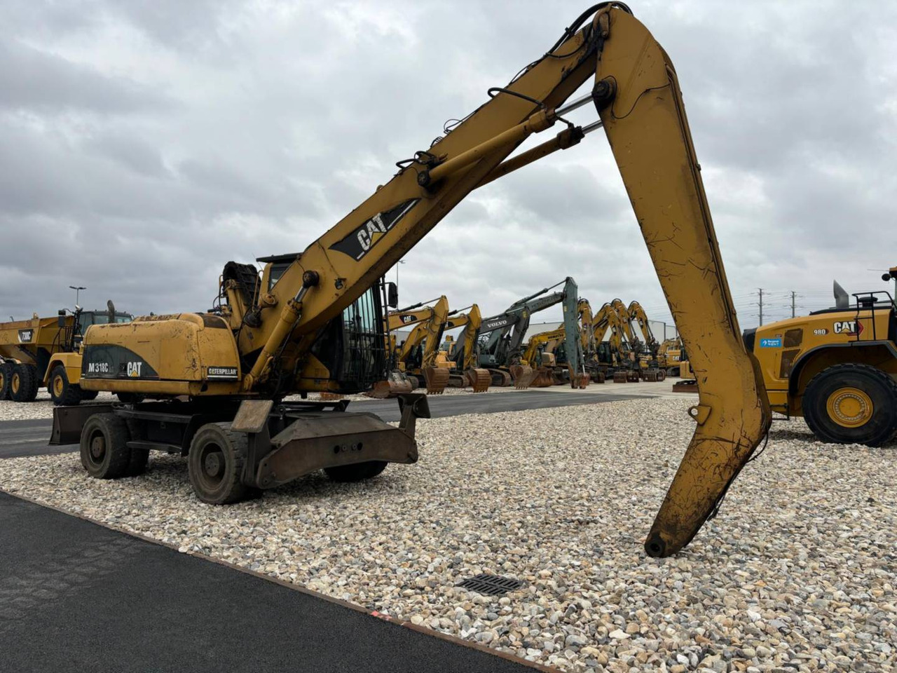 CAT M318C - Bager na kolesih: slika 2 CAT M318C - Bager na kolesih: slika 2