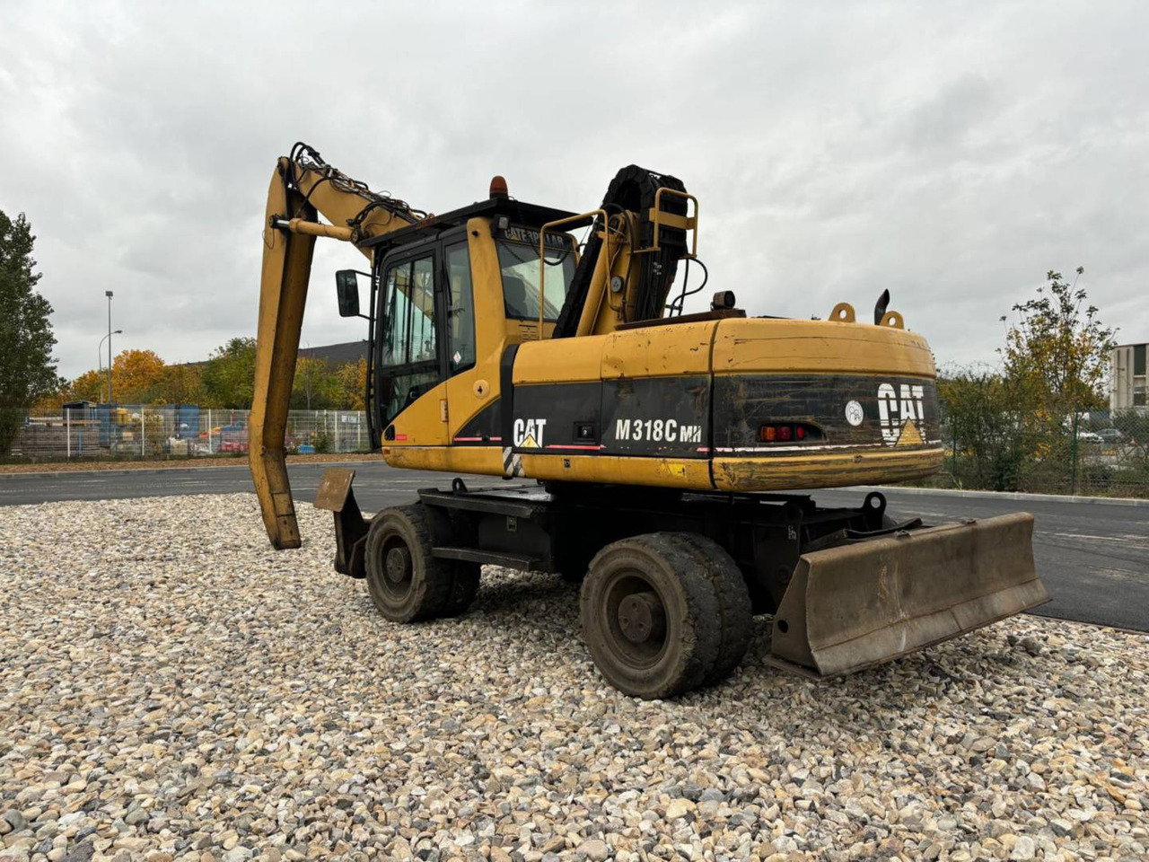 CAT M318C - Bager na kolesih: slika 3 CAT M318C - Bager na kolesih: slika 3