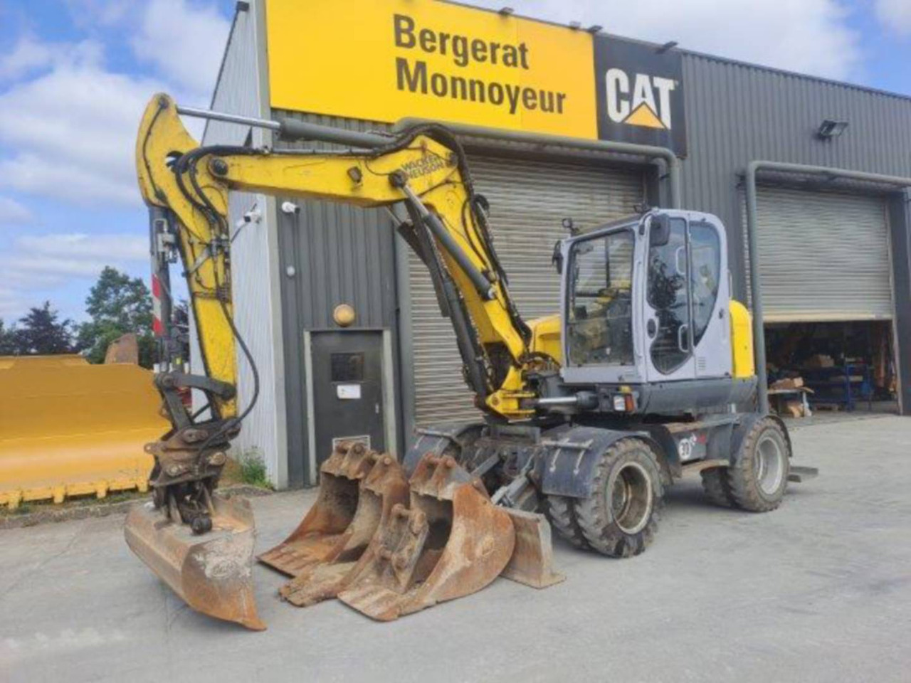NEUSON EW100 - Bager na kolesih: slika 1 NEUSON EW100 - Bager na kolesih: slika 1