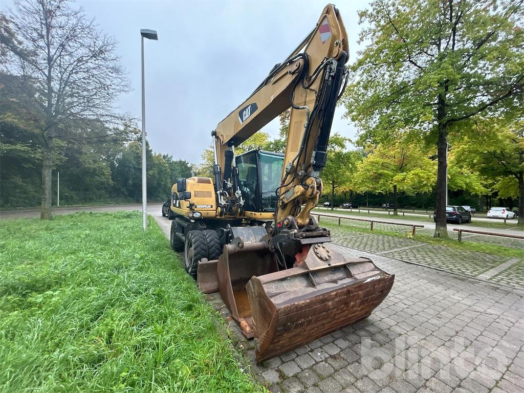 CAT M 318D - Bager na kolesih: slika 2 CAT M 318D - Bager na kolesih: slika 2