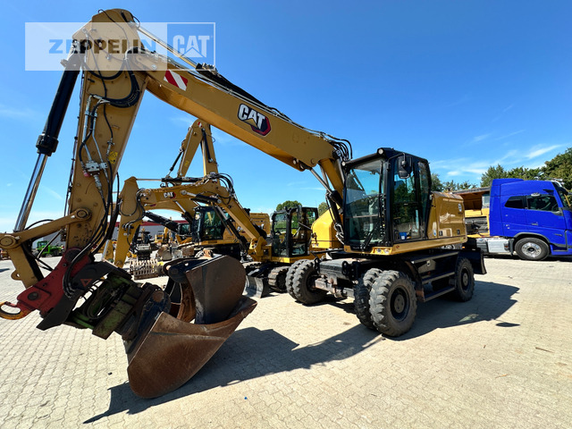 Cat M318-07A - Bager na kolesih: slika 1 Cat M318-07A - Bager na kolesih: slika 1